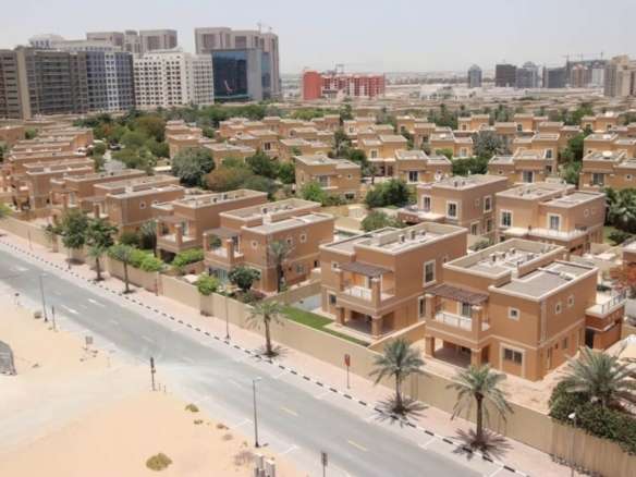 Affordable Property Deals in UAE featuring modern beige villas