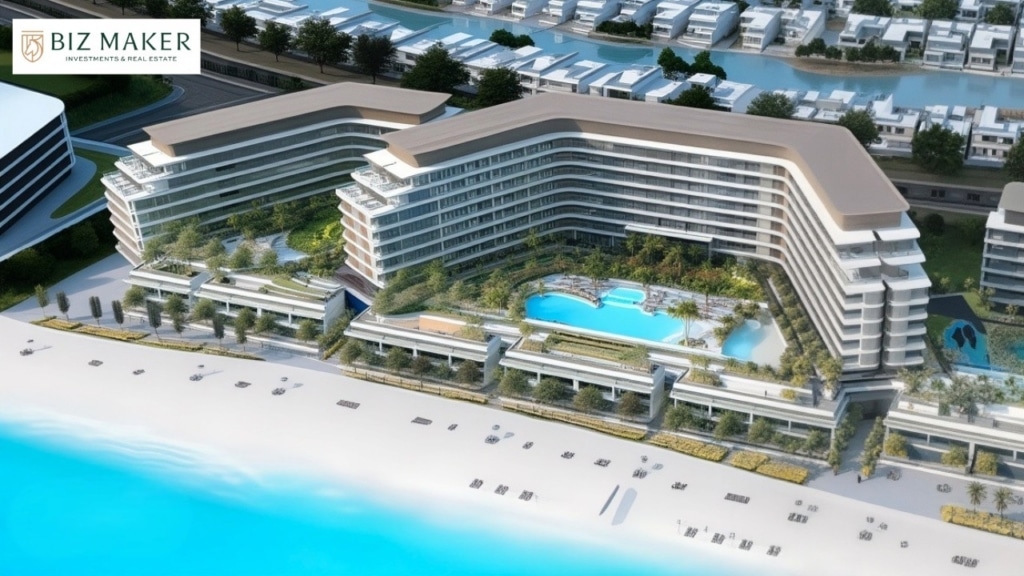 Modern beachfront apartment complex with pool and sea view, ideal for low-cost rental Dubai options offering affordable luxury living.